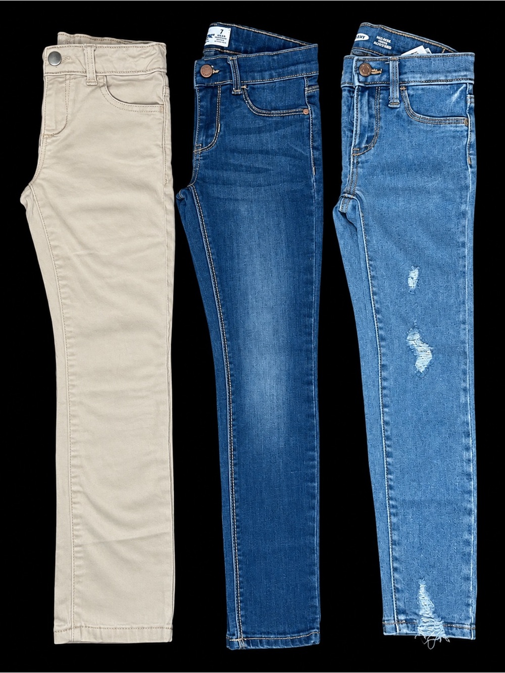 Cute girls’ pants bundle featuring 3 pairs, all size 7! Perfect for everyday wea
